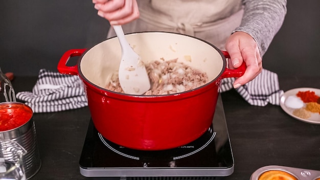 Step by step. Cooking turkey chili in enameled cast iron covered dutch oven.