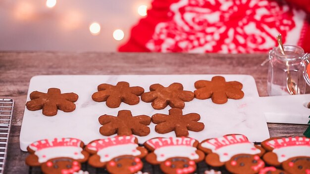 Step by step. Decorating gingerbread cookies with royal icing.