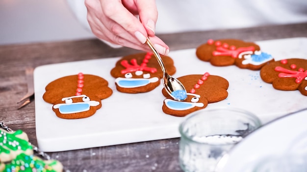 Step by step. decorating gingerbread and sugar cookies with royal icing for christmas