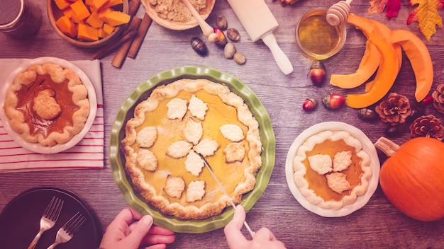 Step by step. Eating slice of freshly baked  pumpkin pie.