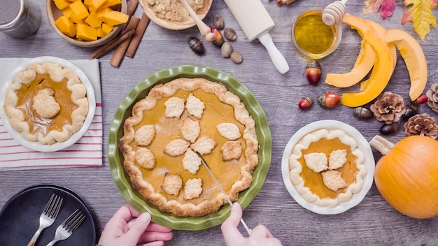 Step by step. Eating slice of freshly baked  pumpkin pie.