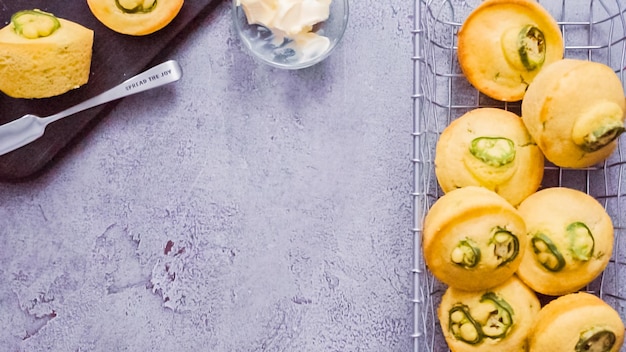 Step by step. Flat lay. Spicy jalapeno cornbread muffins in wired basket.