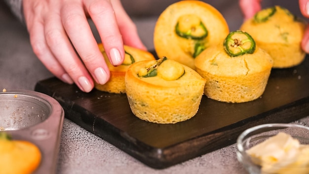 Step by step. Freshly baked slicy jalapeno cornbread muffins.