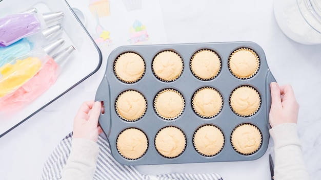 Step by step. Freshly bakes vanilla cupcakes.