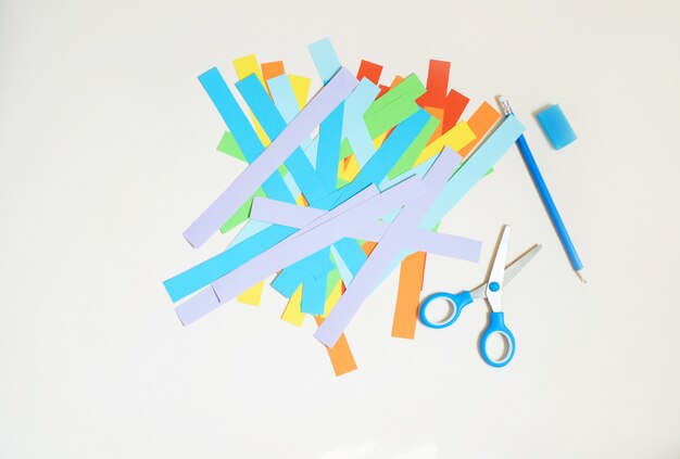 Step-by-step instruction to create a rainbow of colored paper. Creativity with your own hands.