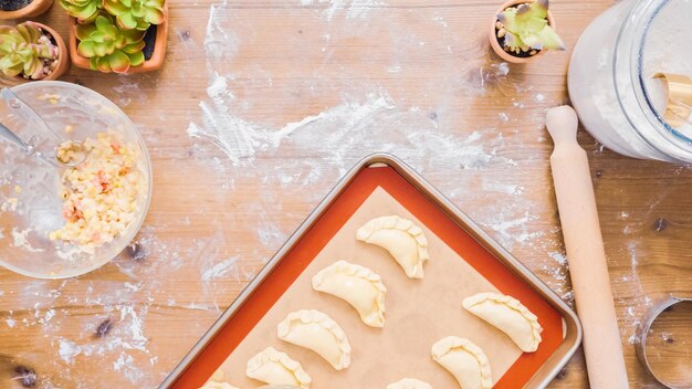 Step by step. Making home made empanadas with different fillings.