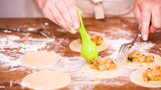 Step by step. Making home made empanadas with different fillings.