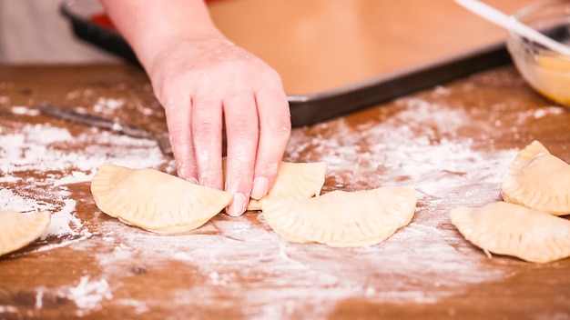 Step by step. Making home made empanadas with different fillings.