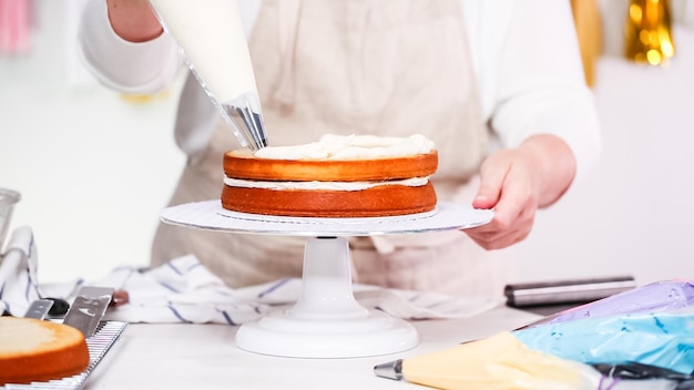 Step by step. Pastry chef making unicorn cake for little girl birthday party.