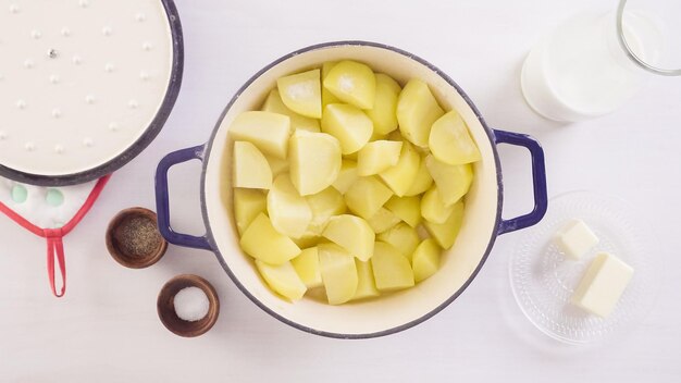 Step by step. Preparing classic mashed potatoes for Thanksgiving dinner.