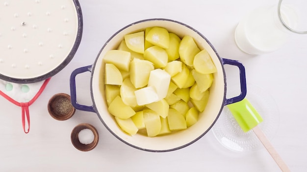 Step by step. Preparing classic mashed potatoes for Thanksgiving dinner.