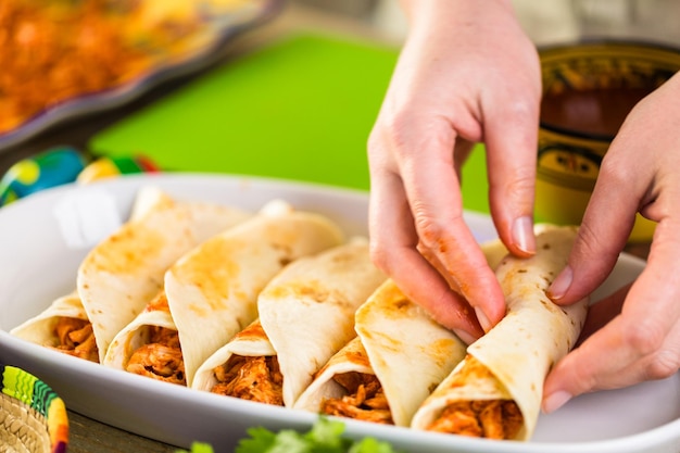 Step by step. Preparing homemade chicken enchiladas.