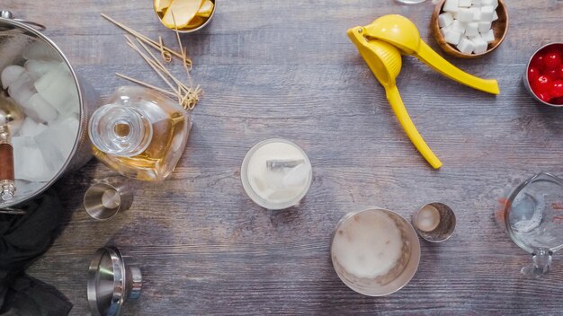 Step by step. Preparing Whiskey sour cocktail at home bar.