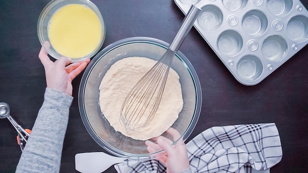 Step by step. Top view. Baking cornbread muffins.