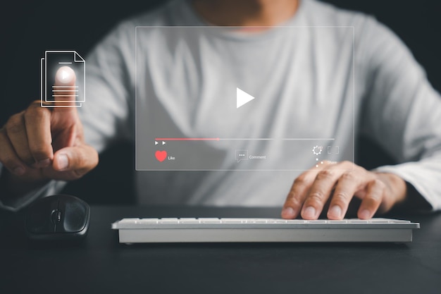 Step into the virtual dimension as a man's hand touches the screen indulging in online videos live concerts and the cuttingedge concept of digital technology