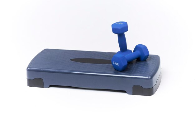 step platform and dumbbells blue dumbbells and blue step platform