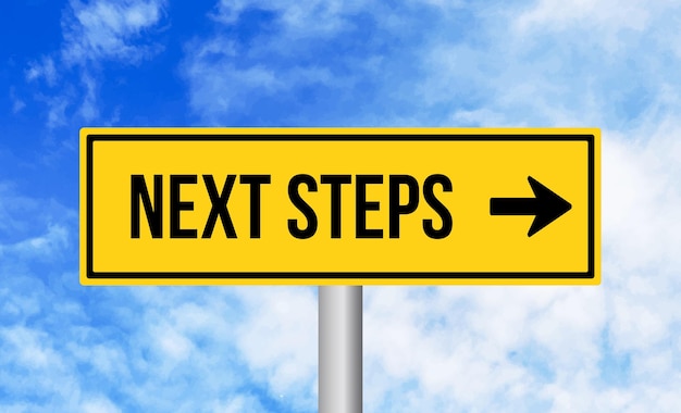 Next steps road sign on sky background