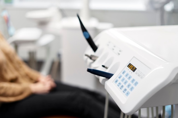 Sterile clean dental instruments A patient in a dental office is treating his teeth treatment without pain