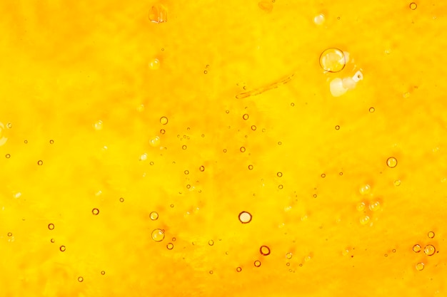 Sterk extract van gouden cannabiswas met een hoge thc close-up bubble shatter-textuur