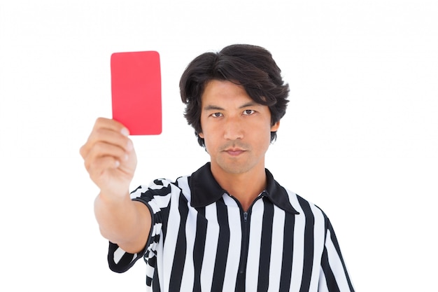 Photo stern referee showing red card