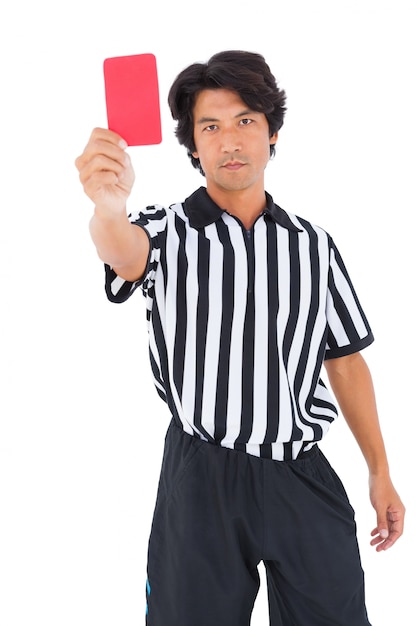 Stern referee showing red card