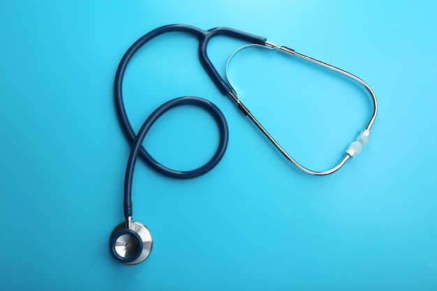 Stethoscope on blue background