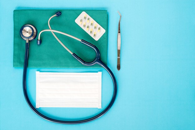 Stethoscope on the blue background