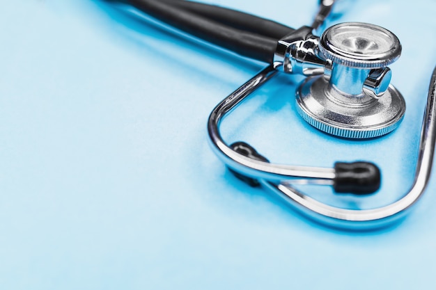 Stethoscope on blue table