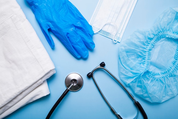 Stethoscope, gloves and medical mask, injections.