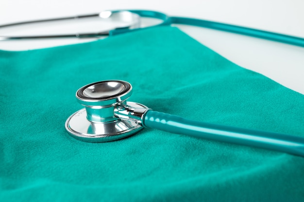 Stethoscope on green cloth in operating room