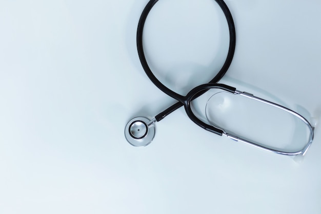 The stethoscope is placed on the table top.