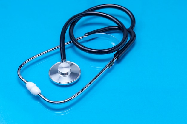 Stethoscope isolated on blue background