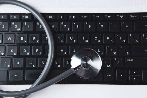 Stethoscope on the keyboard. technical support