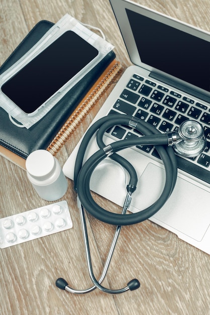 Stethoscope on laptop closeup