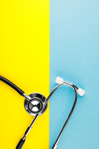 Stethoscope on the national flag of Ukraine blue and yellow war in Ukraine medical care in the war