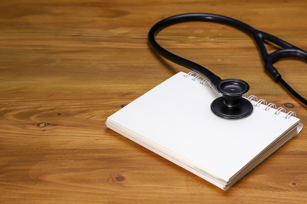 A stethoscope and a notebook