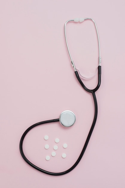 Photo stethoscope on pink arrangement