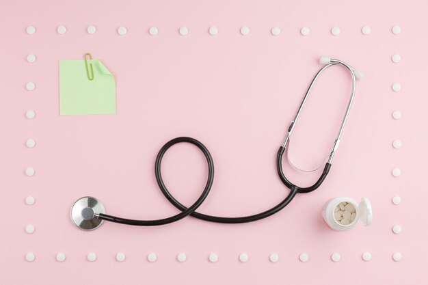 Photo stethoscope on a pink table