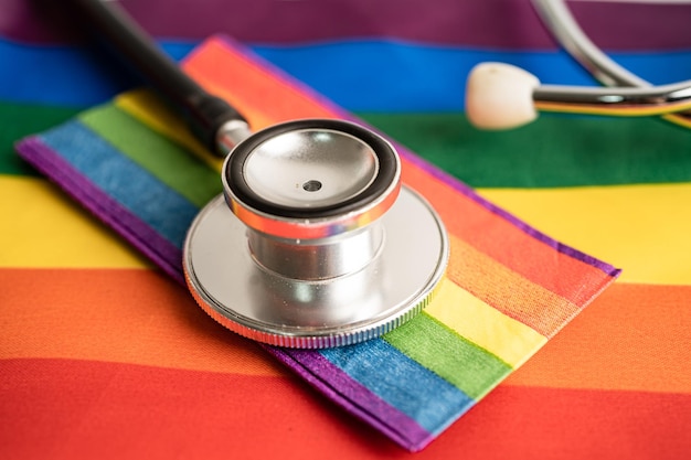 Stethoscope on rainbow flag background symbol of LGBT pride month celebrate annual in June social symbol of gay lesbian bisexual transgender human rights and peace