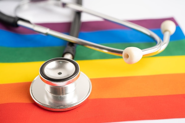 Stethoscope on rainbow flag background symbol of LGBT pride month celebrate annual in June social symbol of gay lesbian bisexual transgender human rights and peace