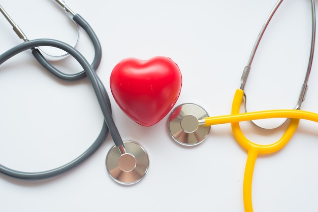 Stethoscope and red heart symbol of health day and good healthy life 