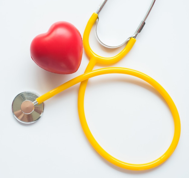 Stethoscope and red heart symbol of health day and good healthy life 