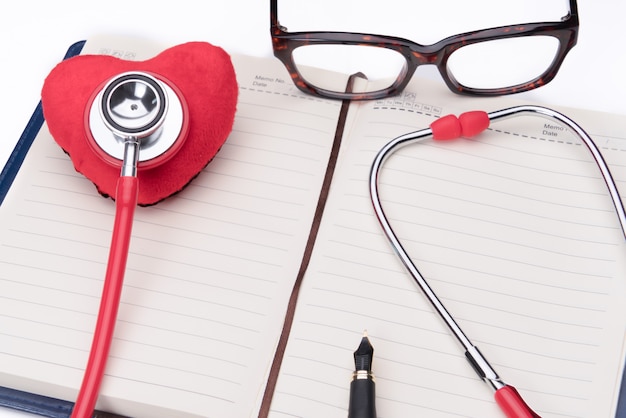 Stethoscope and red heart symbol, healthcare, medicine and insurance