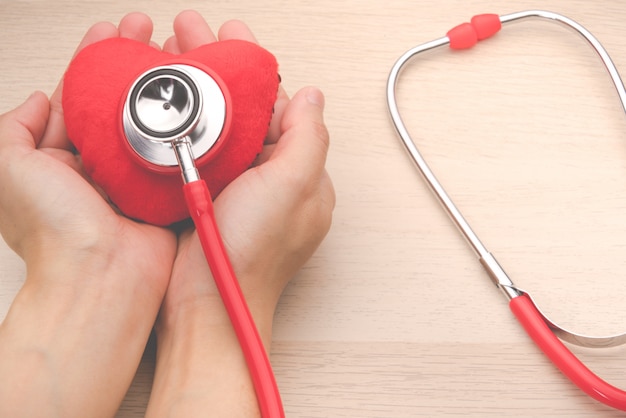 Stethoscope and red heart symbol, healthcare, medicine and insurance