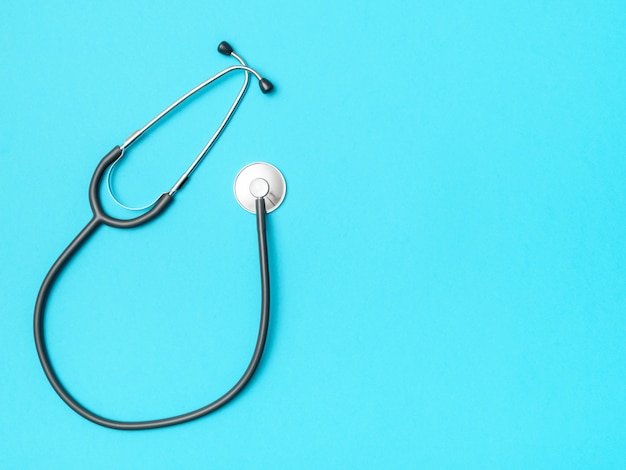 Stethoscope and space for text on color background