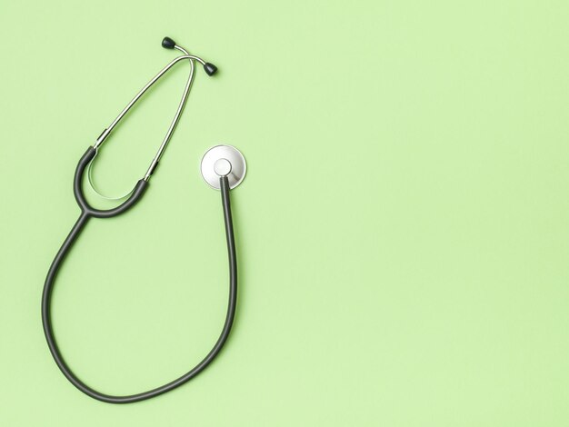 Stethoscope and space for text on color background