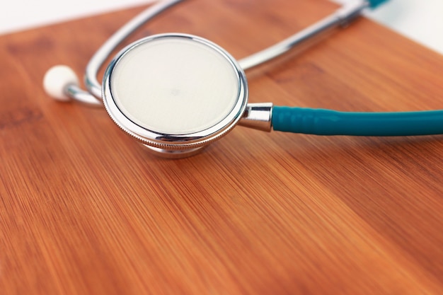 Stethoscope on a wooden desk