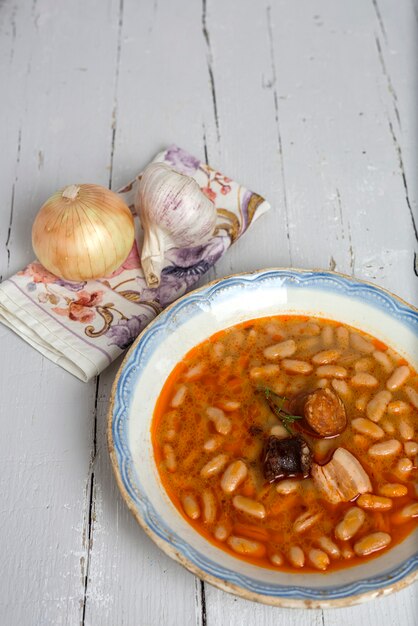 Stew of beans with chorizo and pork