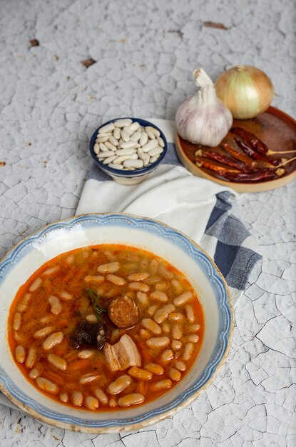 Stew of beans with chorizo and pork