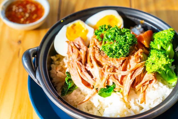 stew pork leg with egg on rice